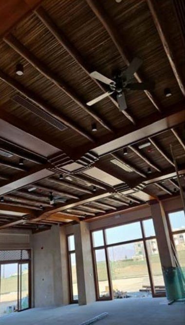 Timber ceiling with linear air diffusers – Dibba Heritage Souq, Sharjah